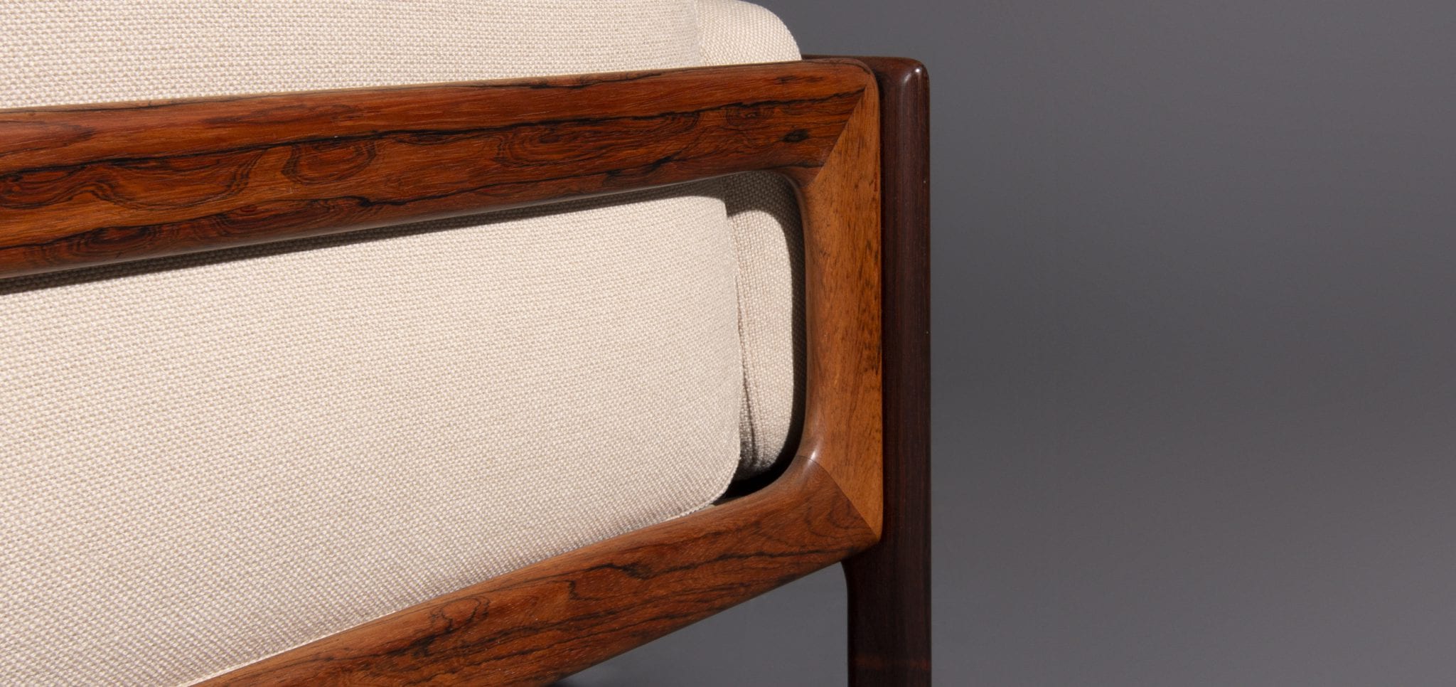Two-seater and rosewood armchair produced by Komfort