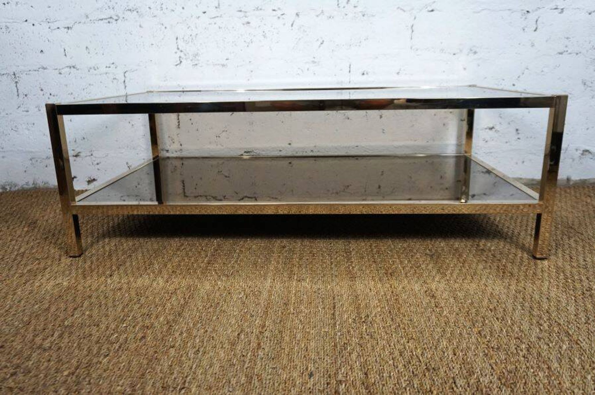 Gold chrome coffee table with double smoked glass tops 1970s