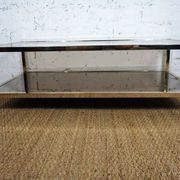 Gold chrome coffee table with double smoked glass tops 1970s