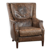 Fauteuil en cuir de vache vintage très confortable avec de belles couleurs.