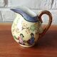 Vintage Japanese fine porcelain tea set with landscape pattern.