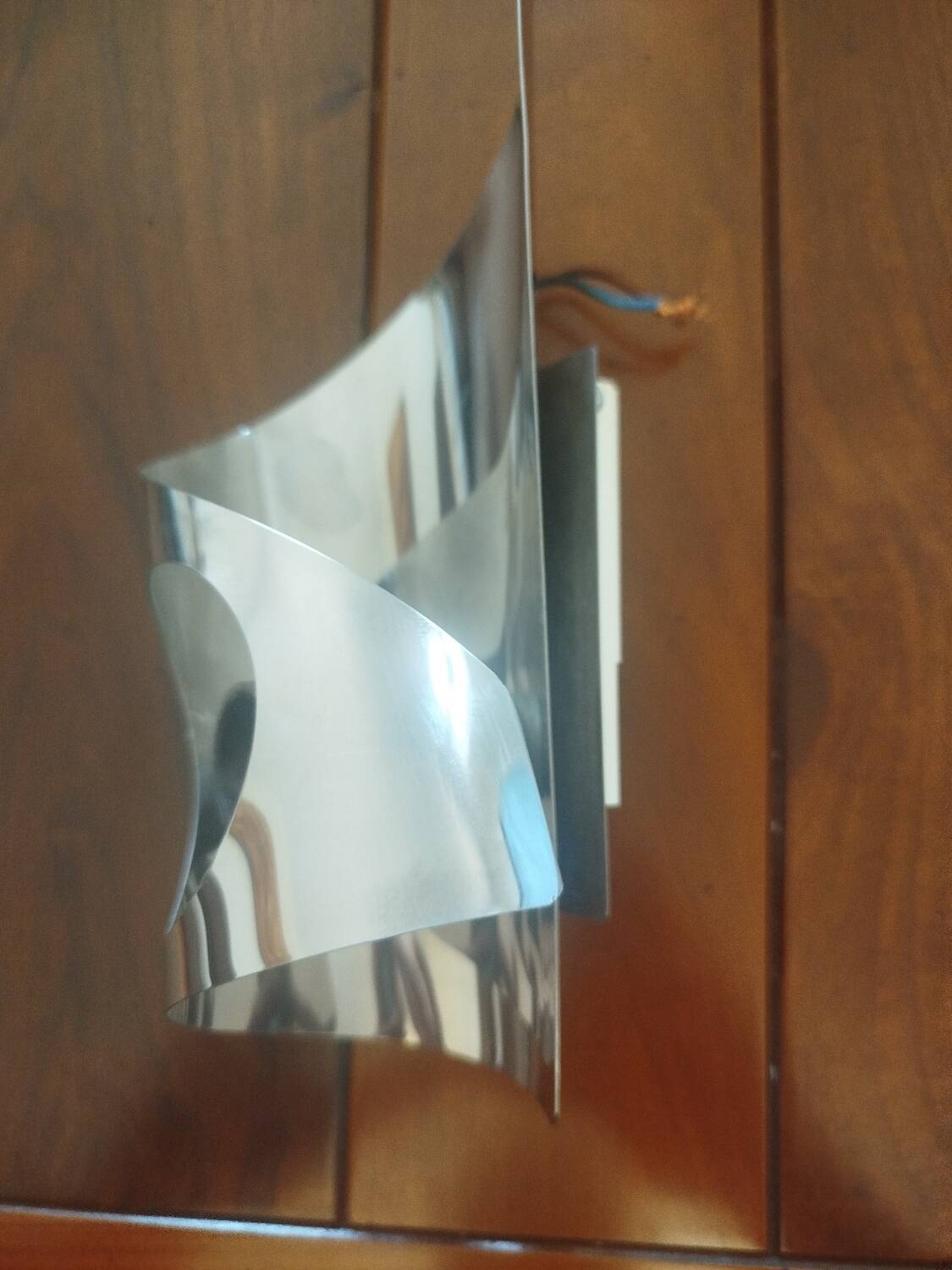 Vintage futuristic wall lamp in chrome sheet metal, space age 70s 80s.