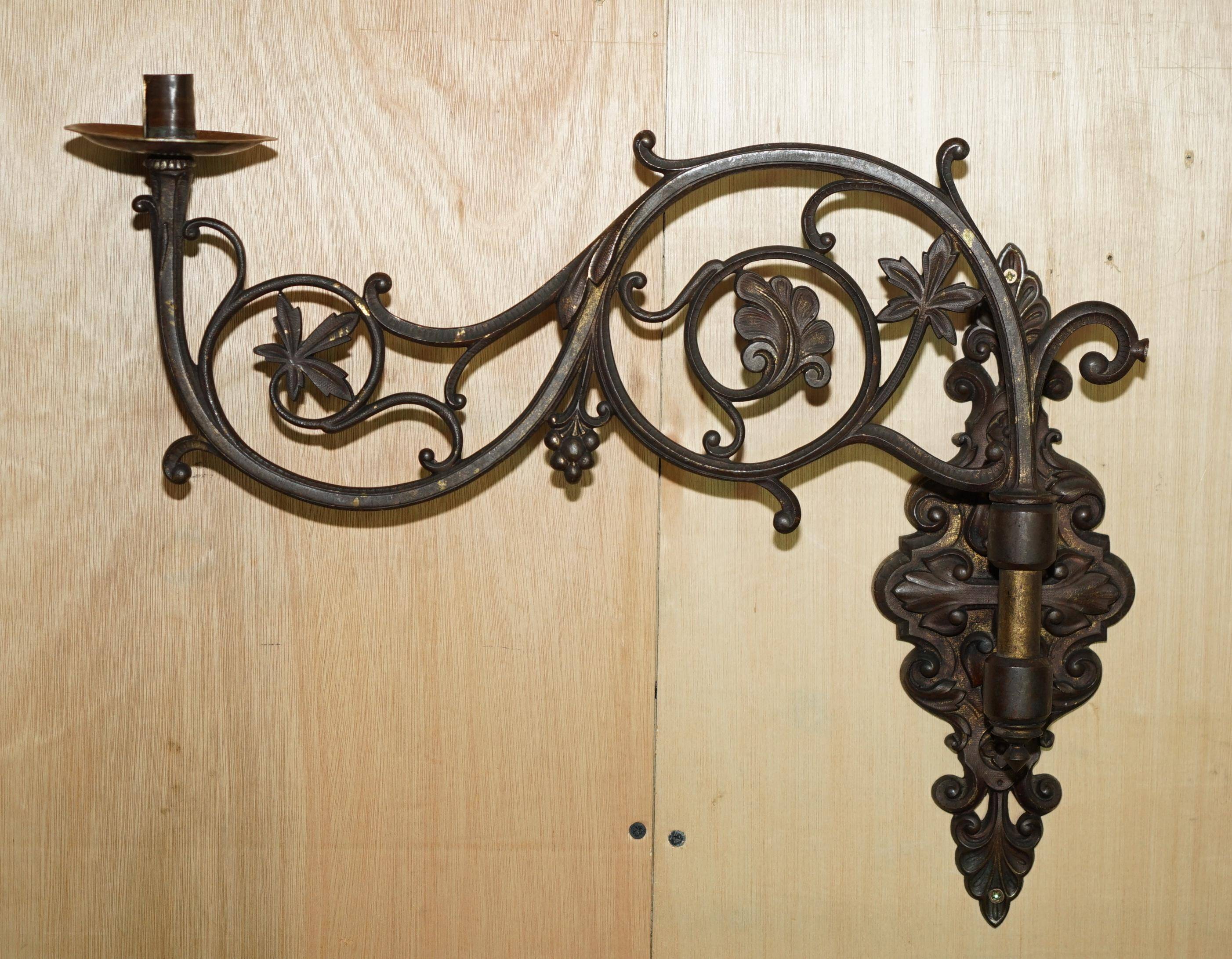 Pair of antique wall sconces in gilded bronze.