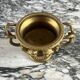 Large Pompeian-style bronze cup with two handles, 19th century.