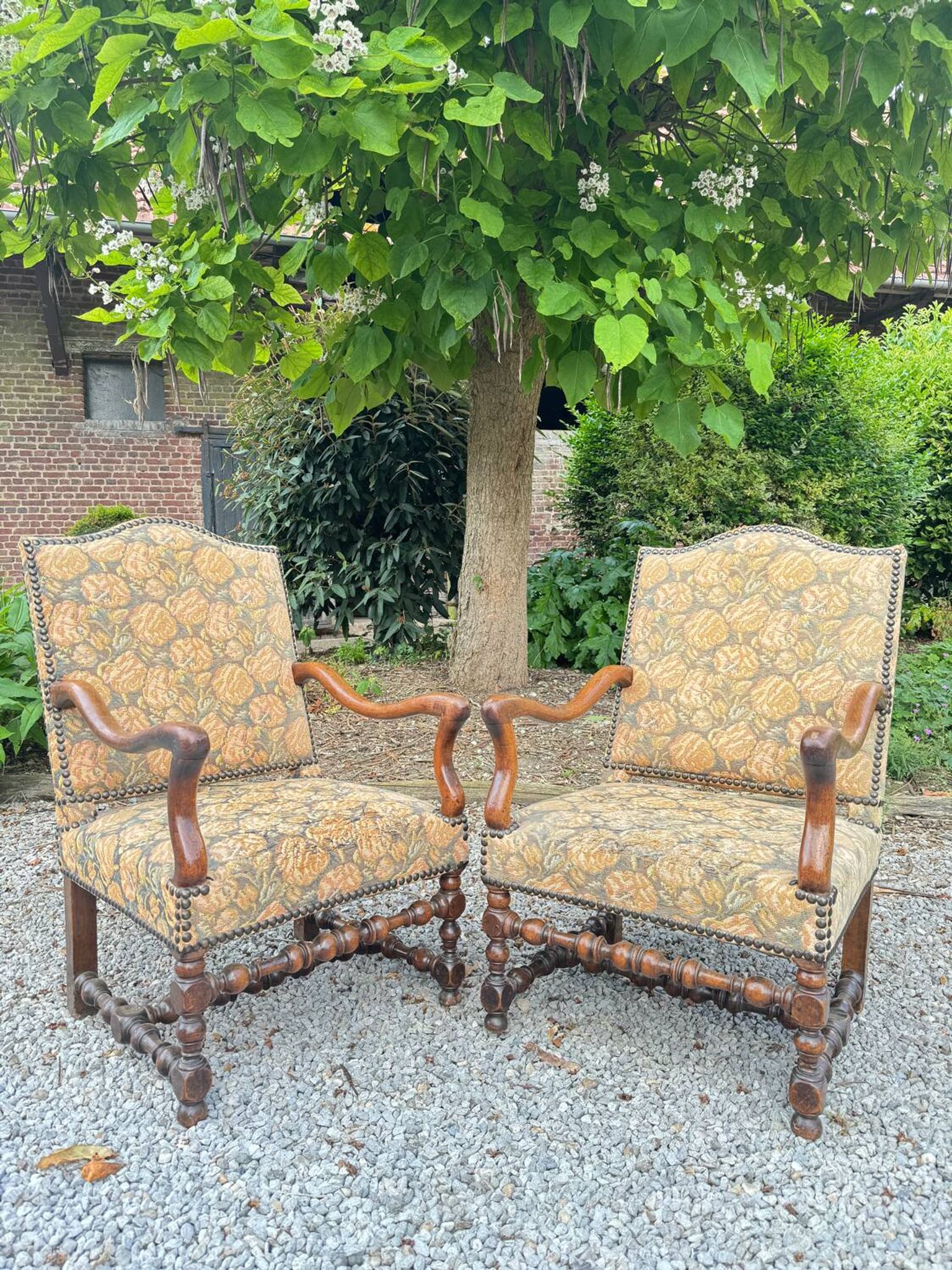 Pair of louis xiv period walnut armchairs, 17th century