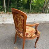 Louis XV armchair in carved solid wood and red and yellow fabric