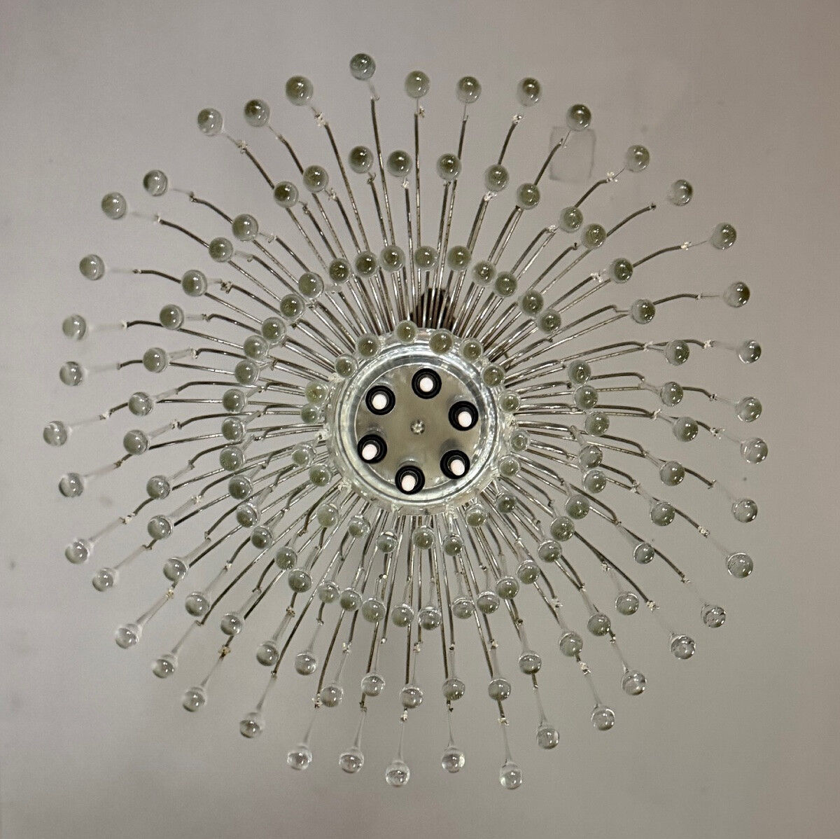 Pair of large chandeliers adorned with glass drops, chrome metal structures, Italy circa 1960.