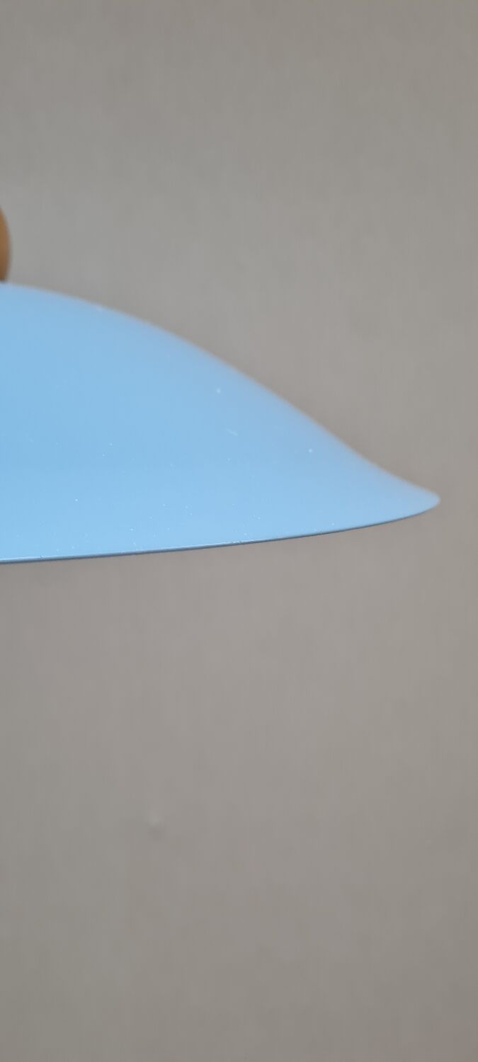 Suspension in enamelled sheet metal and wood