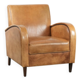 Luxury armchair made of cowhide leather with a beautiful warm colour scheme