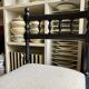 Black turned wooden chair and ivory cotton.