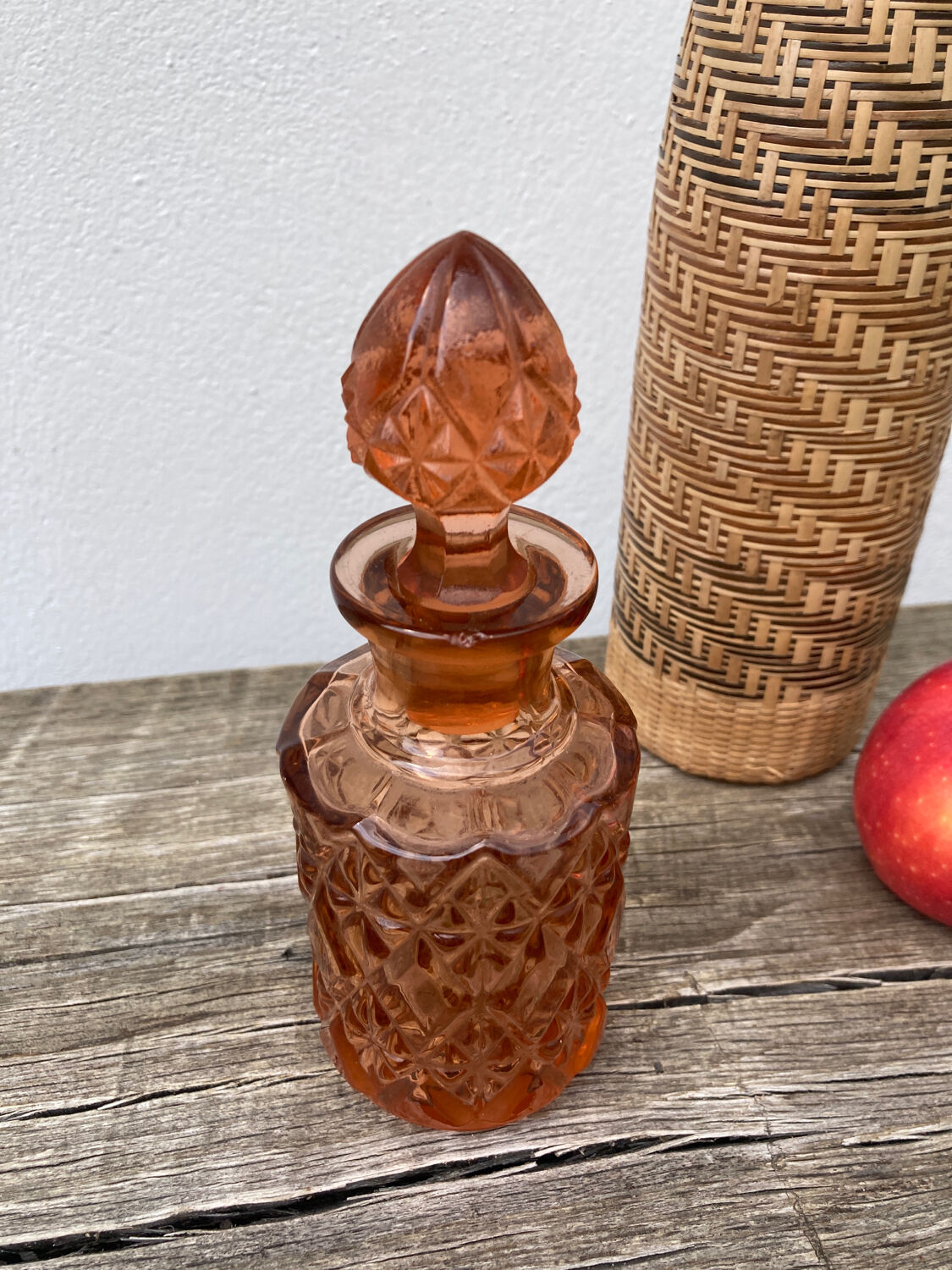 Art Deco perfume bottle in old amber pink glass