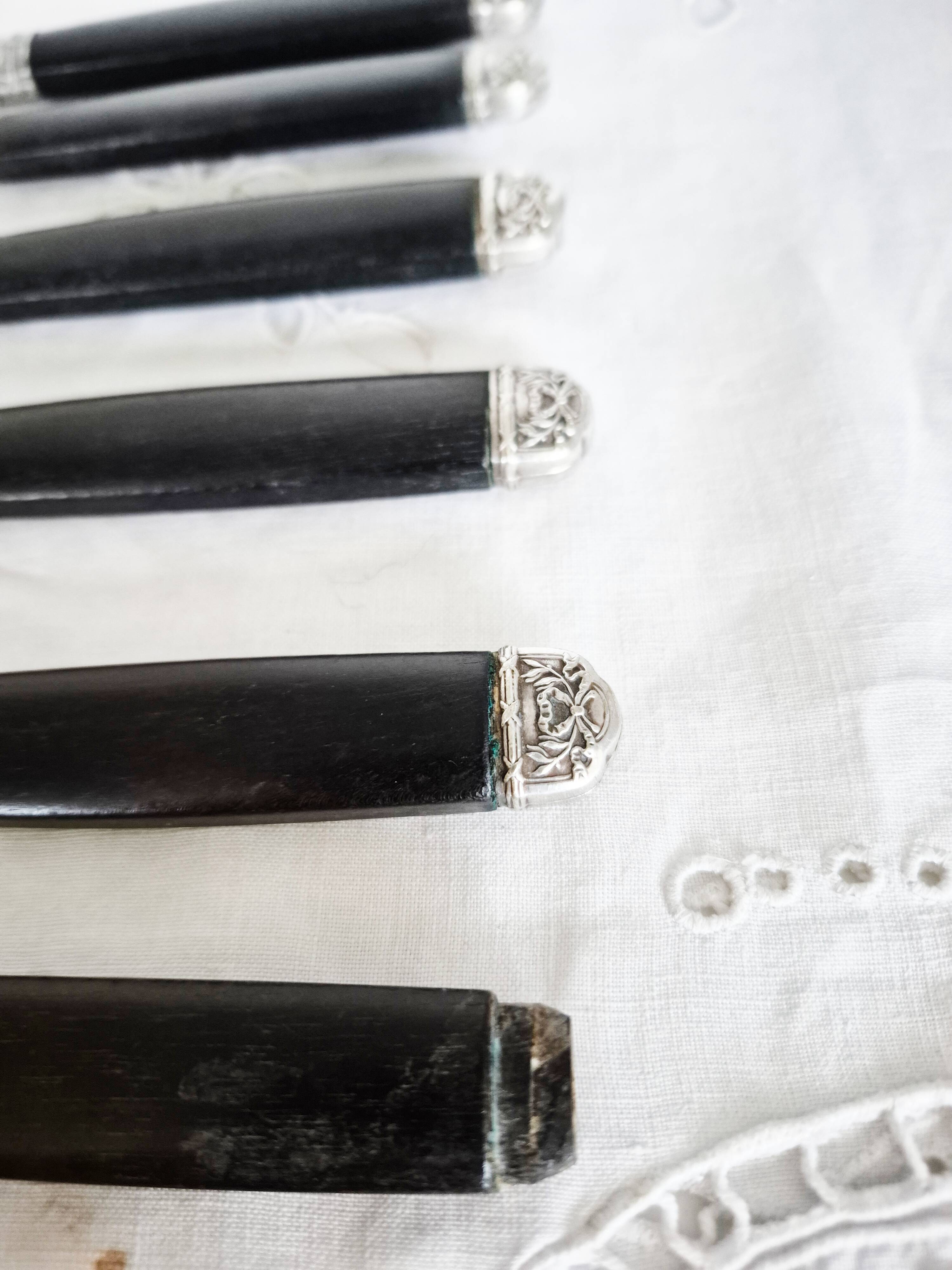 Silver and ebony table knives, stainless steel blade, Louis XVI style