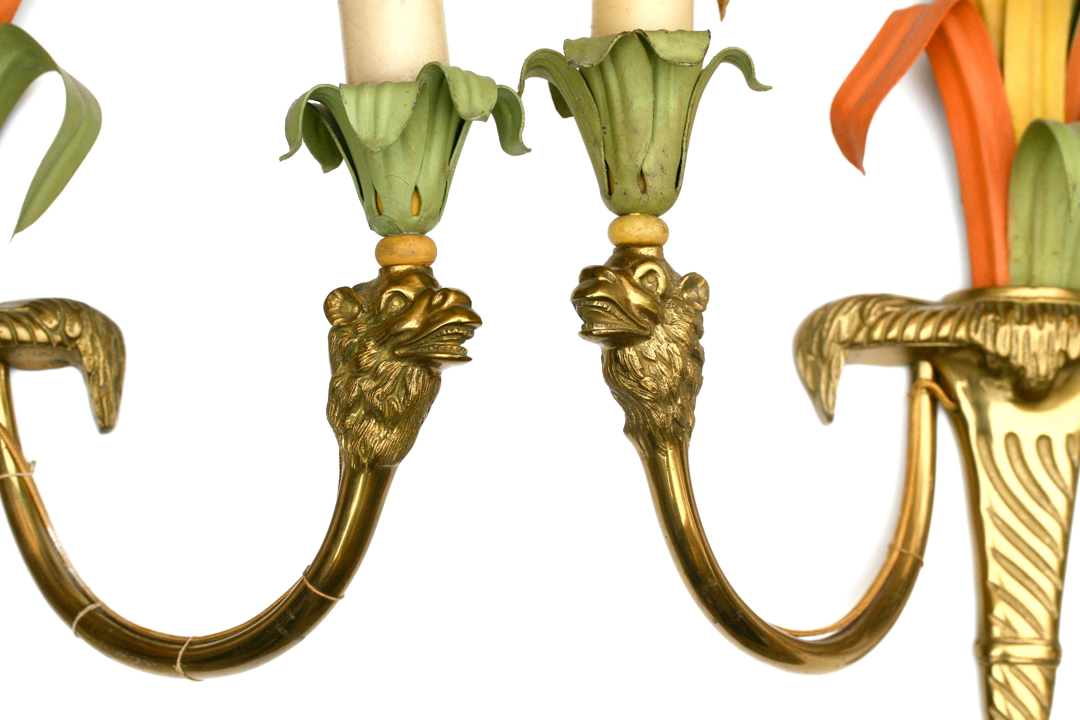 Maison Baguès, three bronze appliques decorated with camel heads and palm leaves