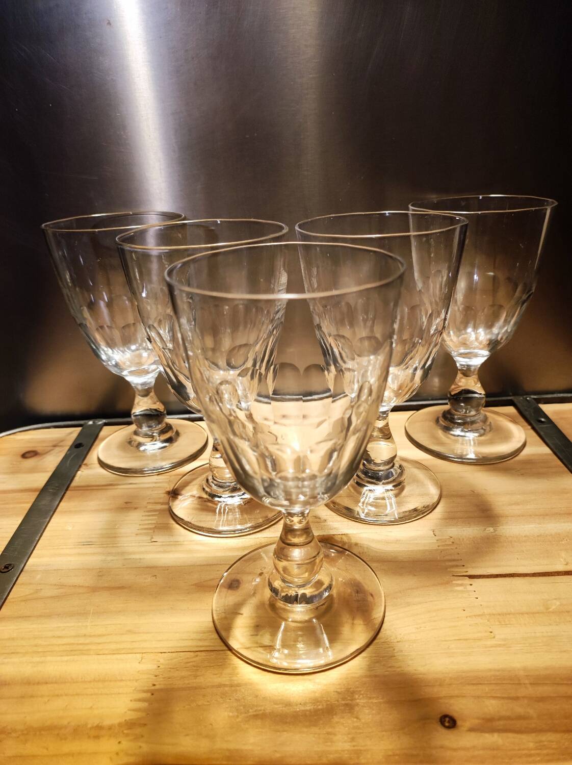 5 antique wine glasses with cut sides