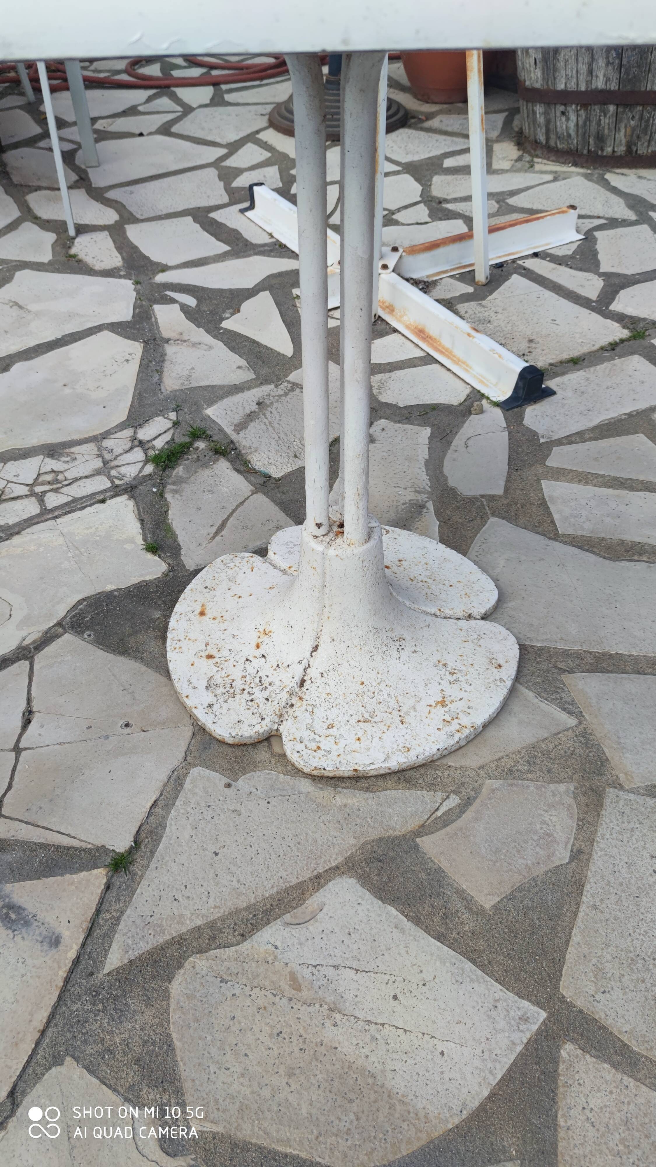 Garden or bistro table with steel and fiberglass base and top, circa 1970