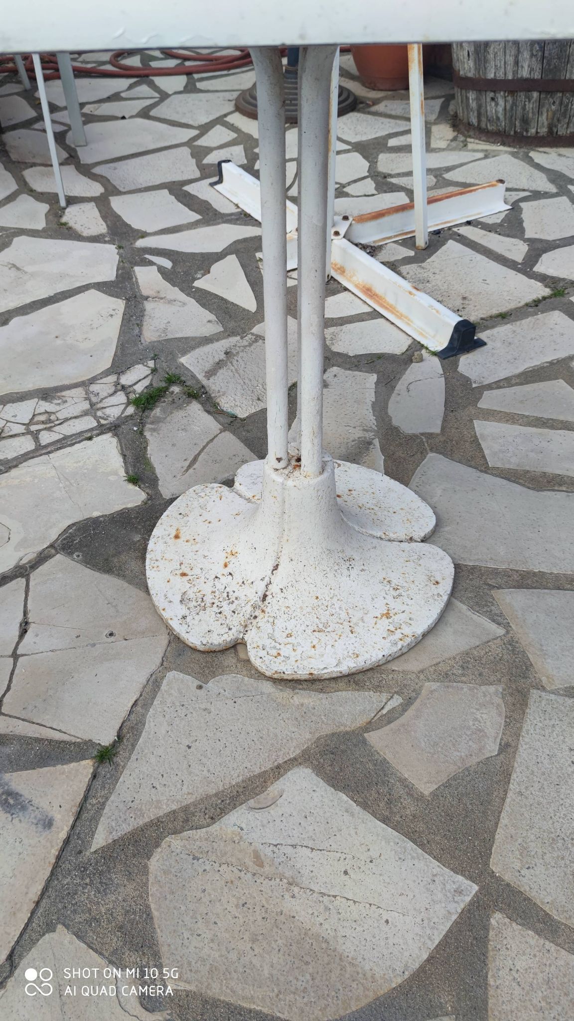 Garden or bistro table with steel and fiberglass base and top, circa 1970