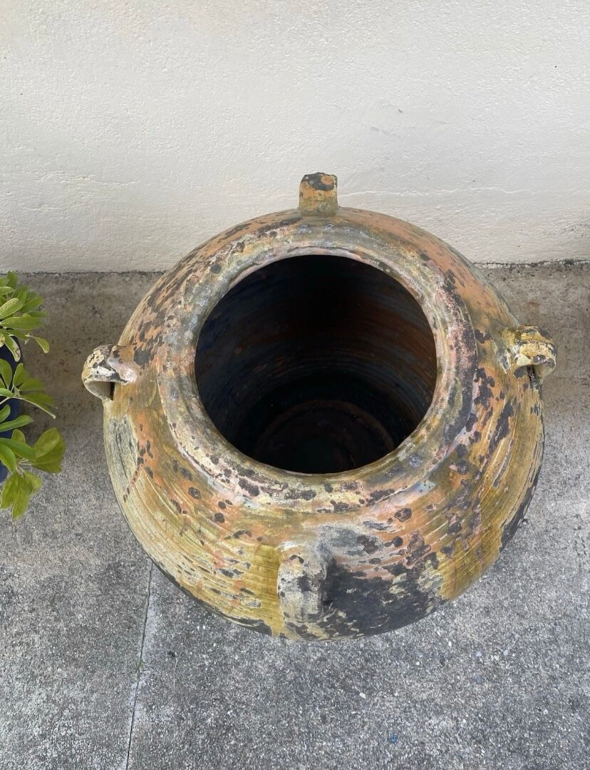 Large ancient jar in glazed terracotta