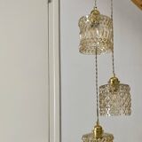 Triple antique globe pendant light in amber glass