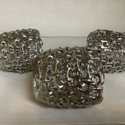 Trio of candle holders in metal strips folk art