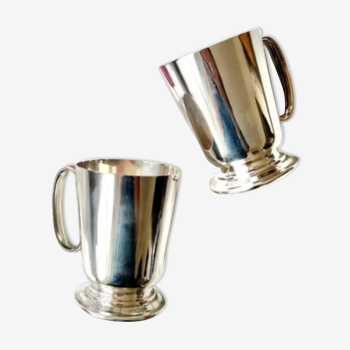 Pair of silver metal cups