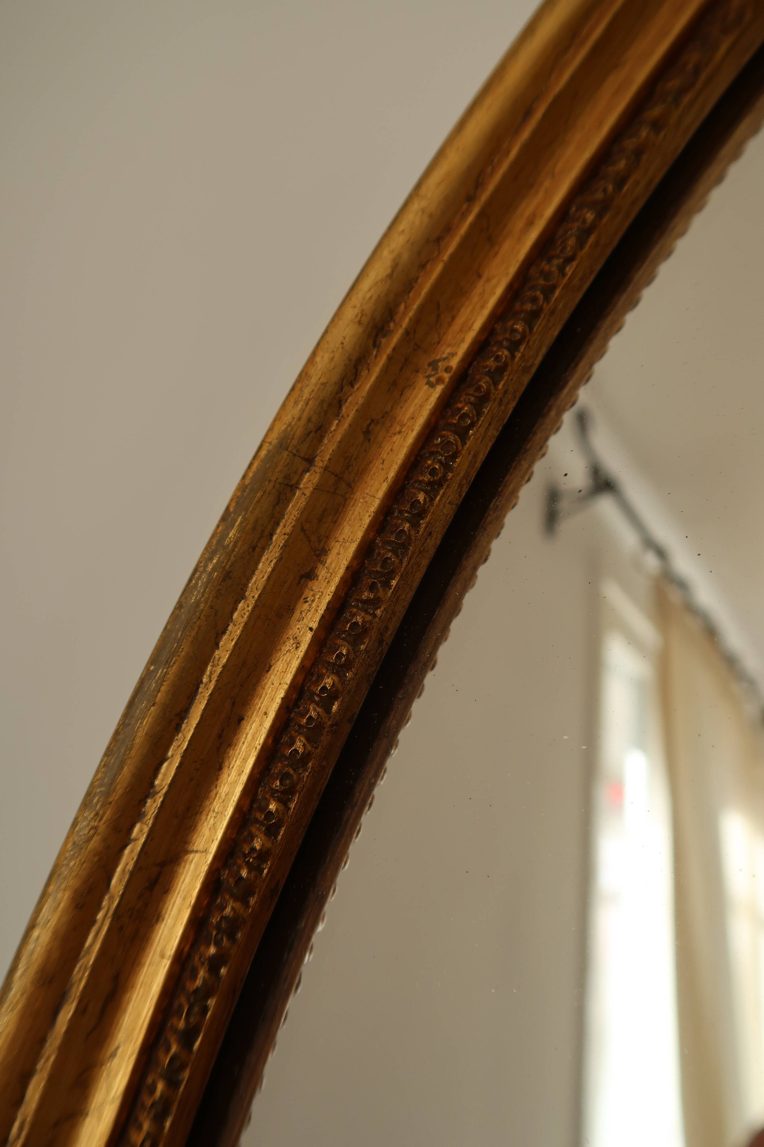 Golden oval mirror - 72x52cm