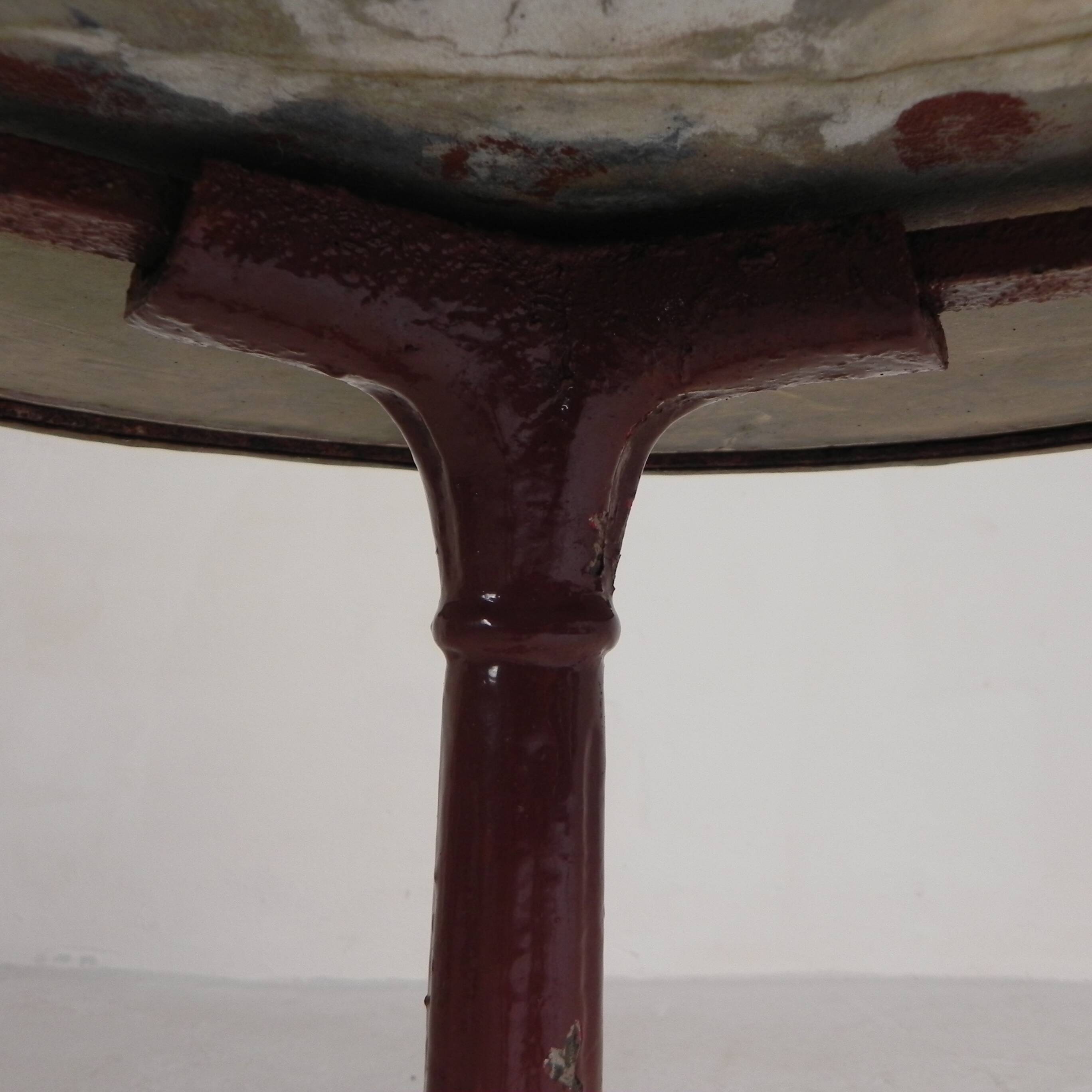 Bistro table with cast iron legs and marble top, 1920s.