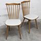 Pair of Baumann Menuet chairs, Honey patina, White skai seat