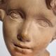 Bust of Bacchus child in patinated terracotta, 21 cm