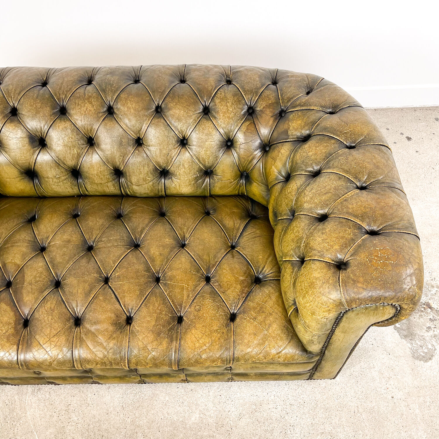 Old vintage leather chesterfield sofa