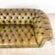 Old vintage leather chesterfield sofa