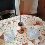 antique chandelier has 3 globes