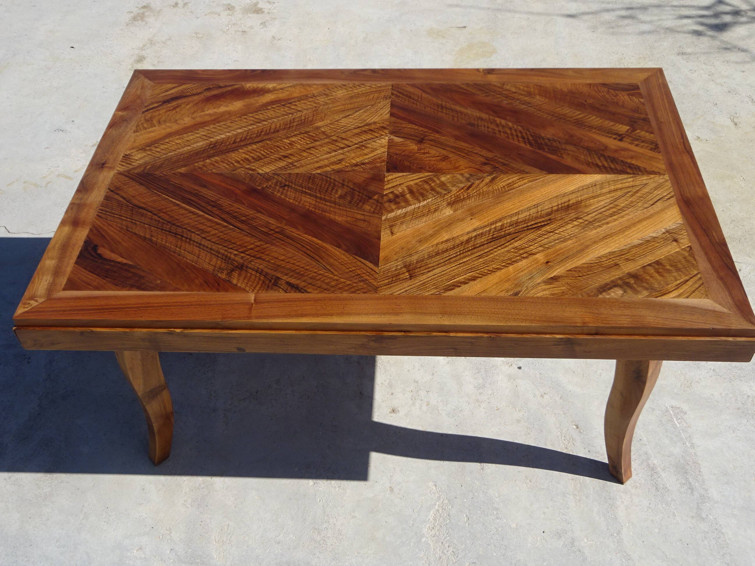 Antique solid walnut table with marquetry and extensions.