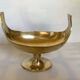Brass cup emptier
