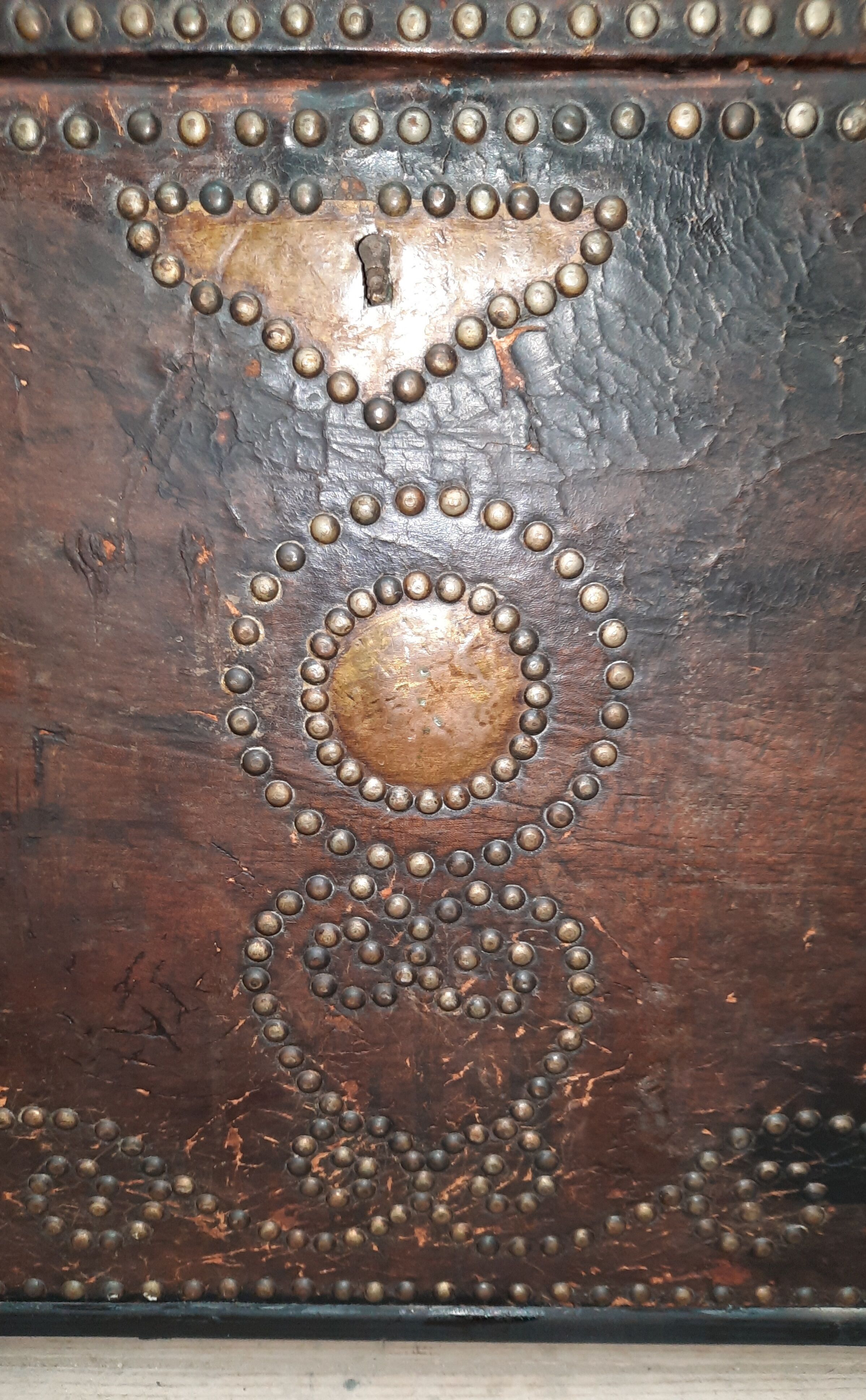 Chest covered with leather and nails