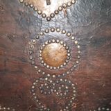 Chest covered with leather and nails