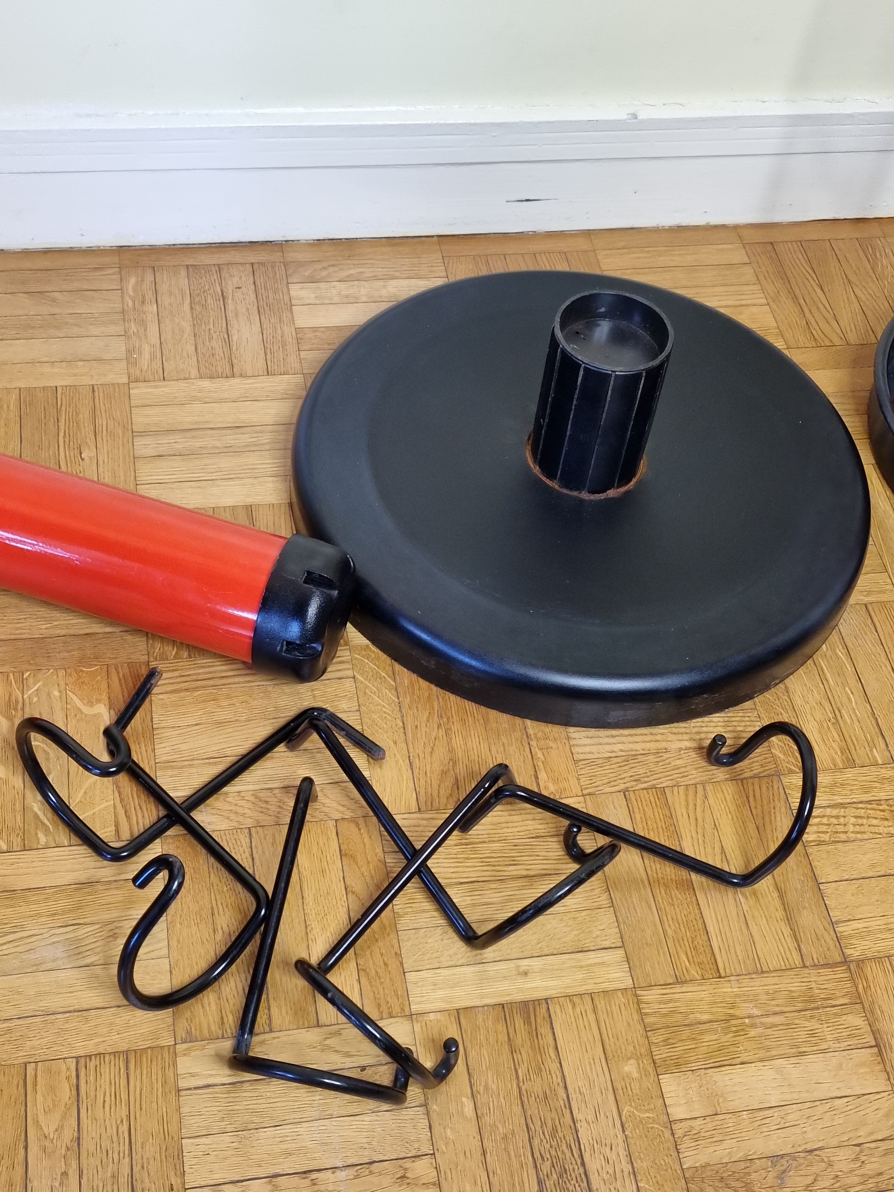 Coat rack in orange lacquered metal published by Seccose, 80s