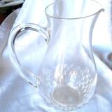 Crystal pitcher engraved with petals