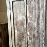 Large Parisian oak wardrobe from the early 20th century with an antique white patina