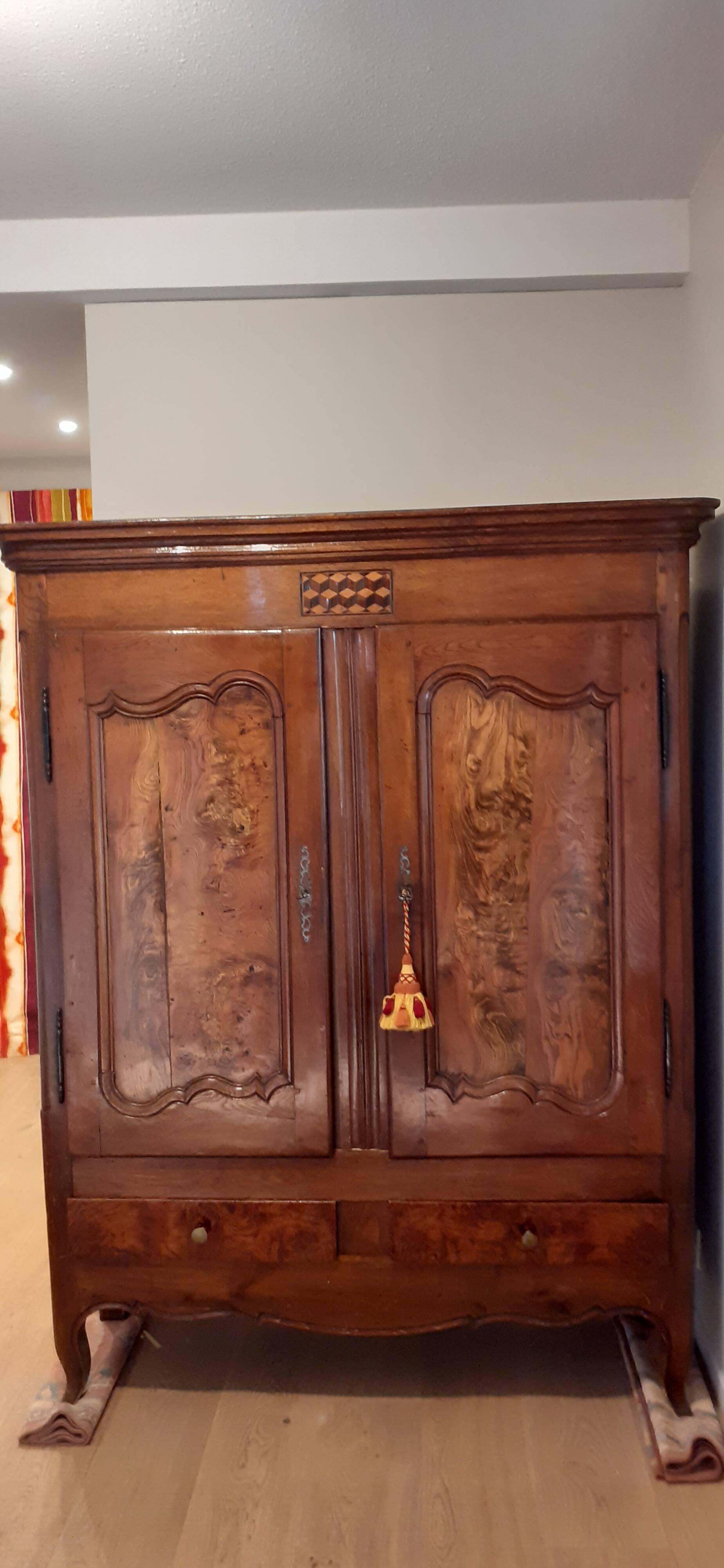 Antique cabinet with elm burrolled doors