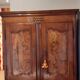 Antique cabinet with elm burrolled doors