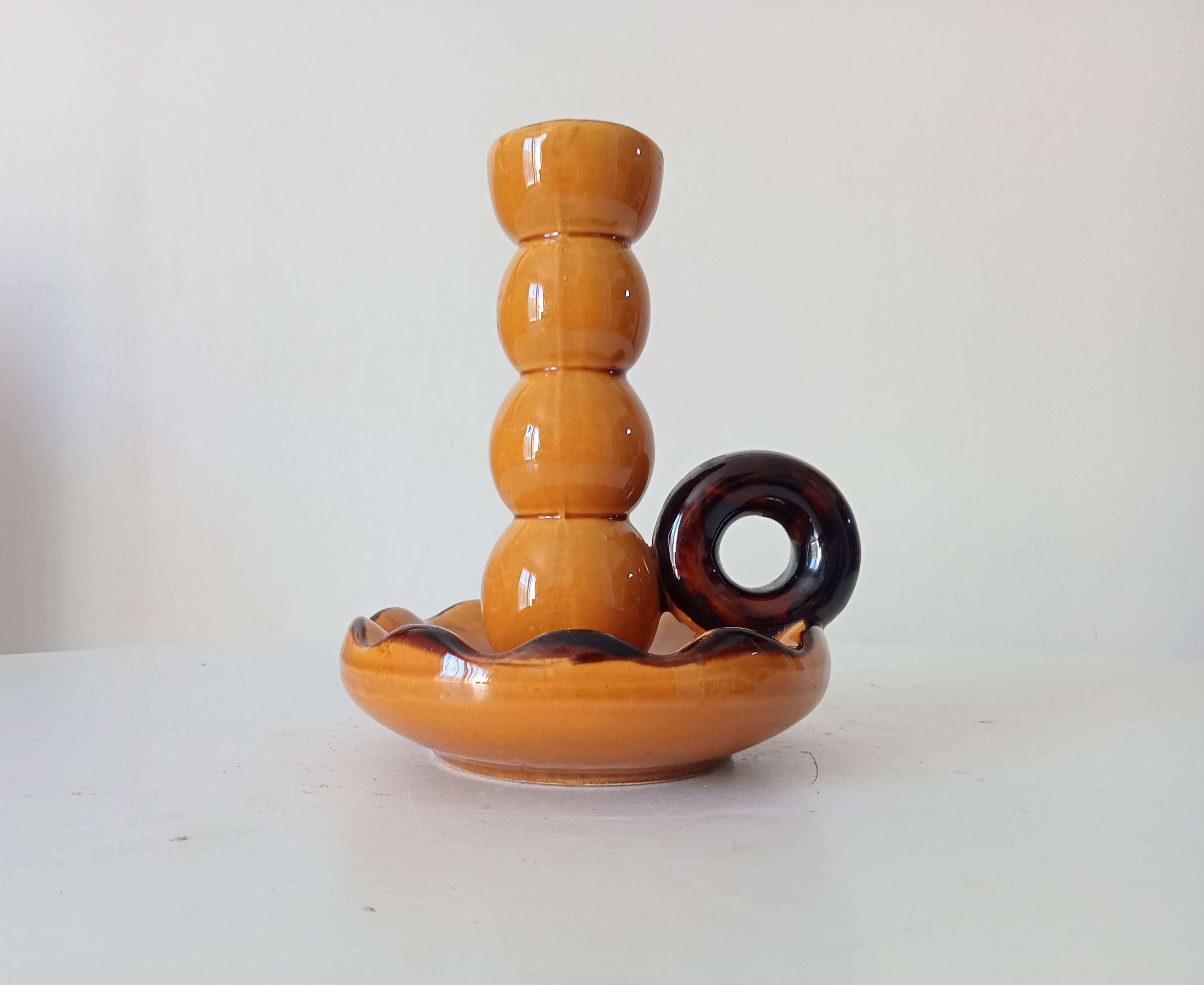 Vintage hand-held candlestick in glazed ceramic