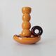 Vintage hand-held candlestick in glazed ceramic