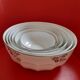 5 Old dishes; Trundles White porcelain with patterns flaurs in matt silver.