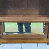 Early 20th-century English wall shelf in walnut.