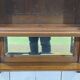 Early 20th-century English wall shelf in walnut.
