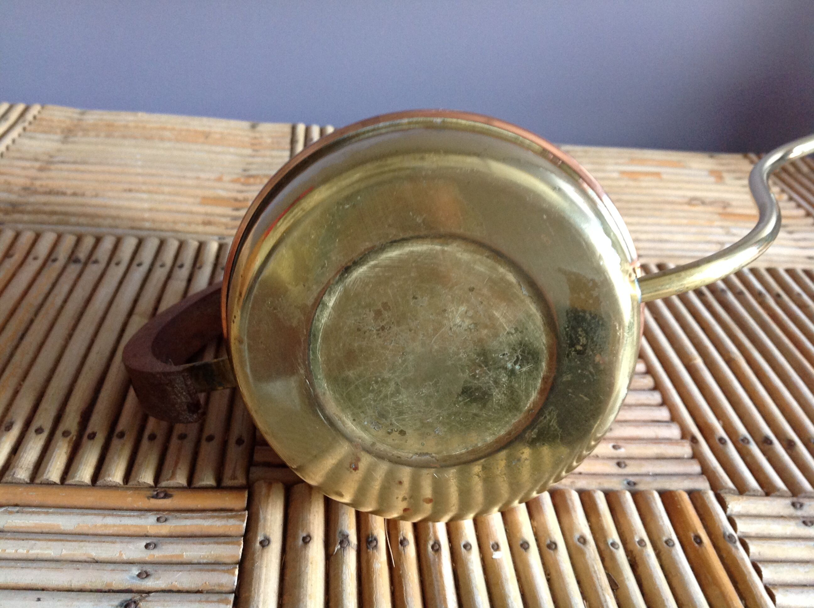 Copper and brass watering can