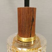 Older Swedish hanging lamp in multi-layered crystal glass with rosewood top and brass ring.