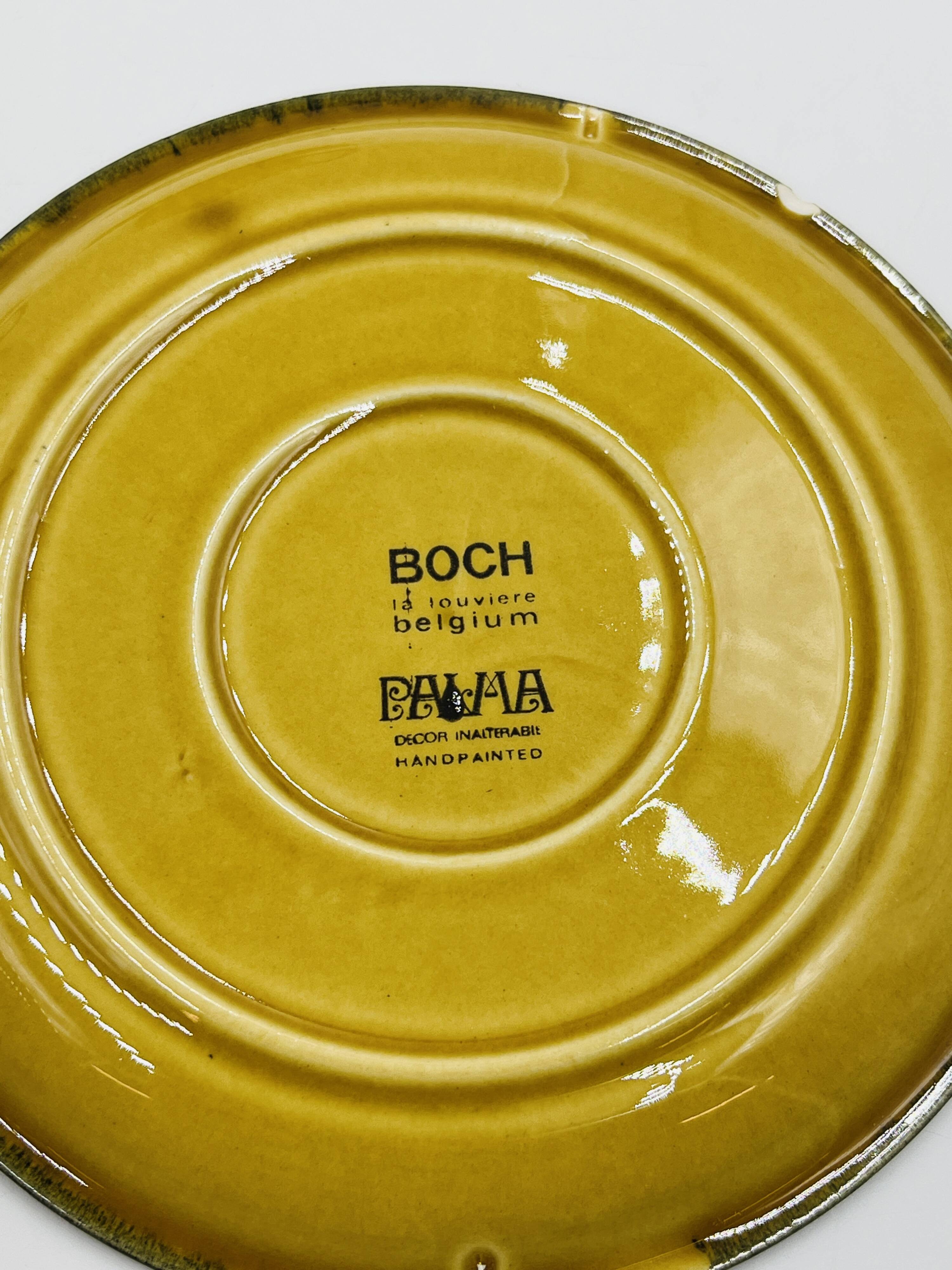 Set of four vintage Boch Palma cups and saucers.