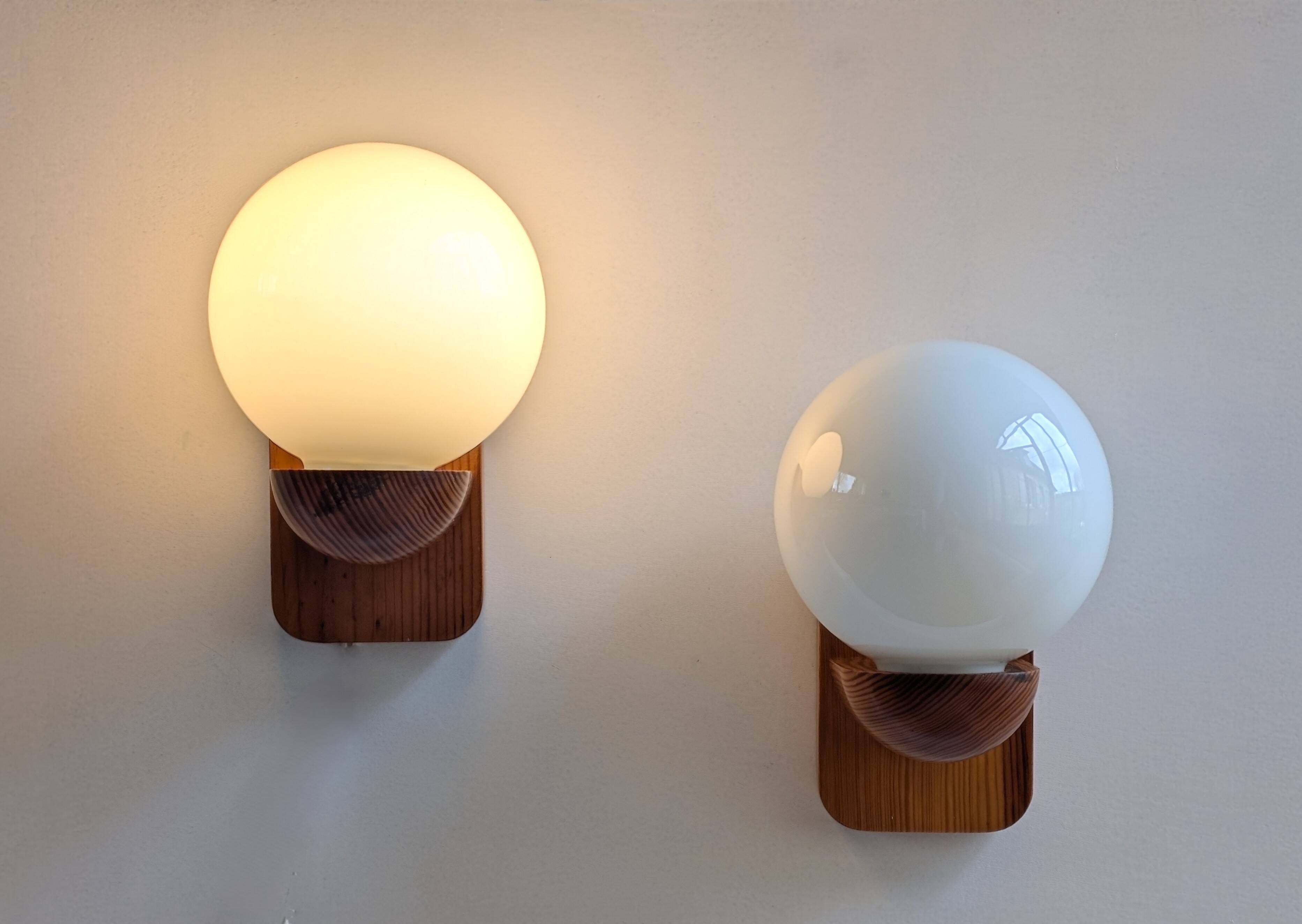 Pair of solid pine and opaline wall lights