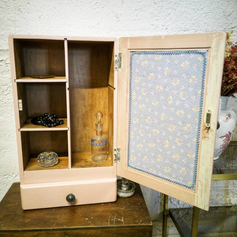 Pink bathroom cabinet